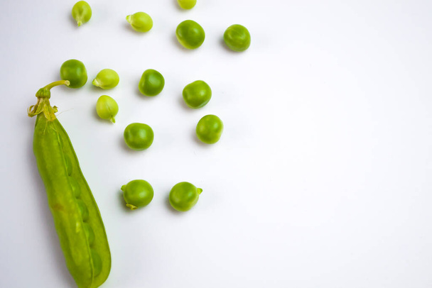 Green peas on a white background, your dietary lifestyle. - Photo, Image