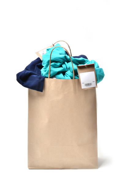 vêtements dans un sac à provisions
 - Photo, image