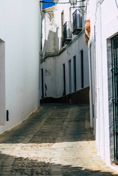 Carmona Spain July 14, 2021 Narrow street in town of Carmona called The Bright Star of Europe, the town shows a typical narrow and meandering Arabic layout which will transport you to a distant past - Zdjęcie, obraz