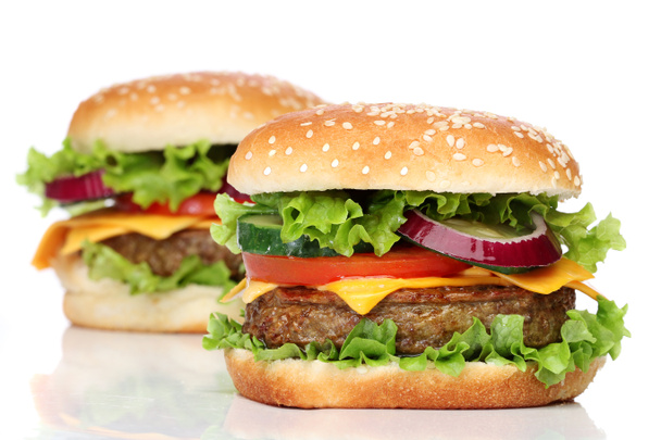 két ízletes hamburgert elszigetelt fehér - Fotó, kép