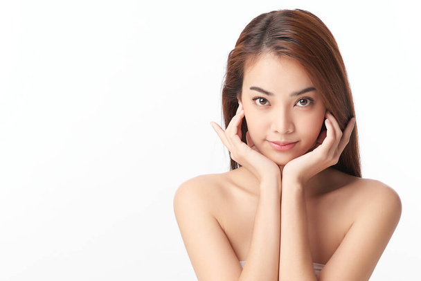 Beautiful young asian woman with clean fresh skin on white background, Face care, Facial treatment, Cosmetology, beauty and spa, Asian women portrait. - 写真・画像