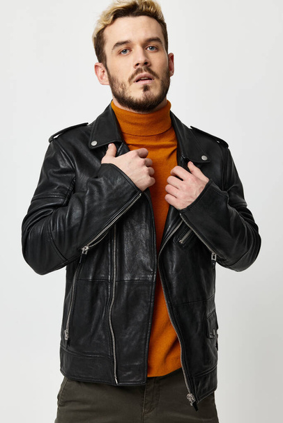 wax leather jackets orange sweater blond bushy beard model - Photo, Image