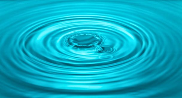 falling drops on the water surface, splash, ripples on the water, blue color - Photo, Image