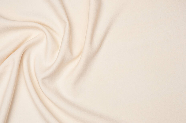 Gładka elegancka tkanka słoniowa abstrakcyjne tło. Tło tekstylne. Tapeta do tkanin. Element projektu graficznego - Zdjęcie, obraz