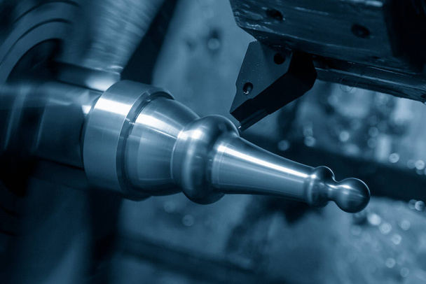 CNC lathe machine forming cut the metal shaft parts hi-technology metal working processing by CNC turning machine . - Фото, зображення