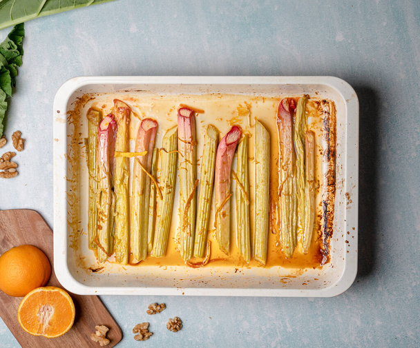 A closeup shot of cooked rhubarb stalks. Top view. - 写真・画像