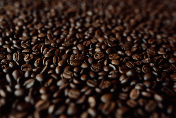 A closeup background of coffee beans - Foto, Imagem