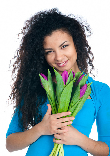 Cute young women with the flowers - Foto, imagen