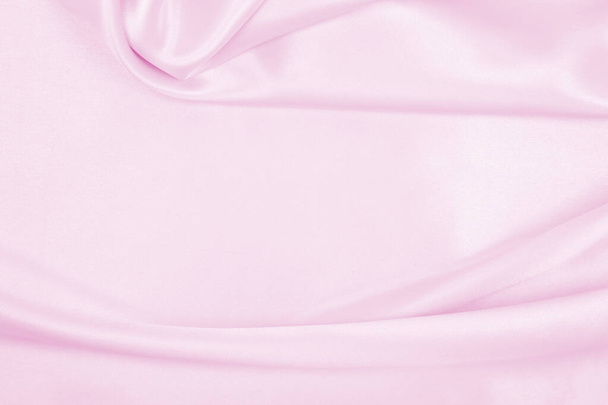Smooth elegant pink silk or satin texture can use as wedding background. Luxurious background design - Foto, afbeelding