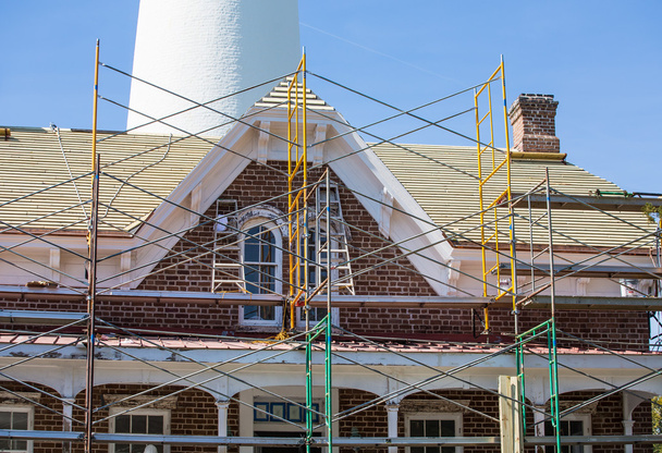 Scaffolding on Brick Keepers House by Lighthouse - Photo, Image