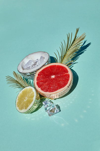 Disco balls as extic fruits. Creative conceptual background. Top view. Flat lay, - Fotoğraf, Görsel