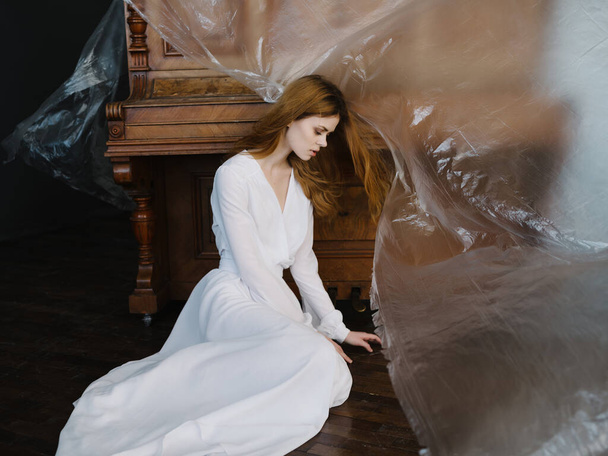 Woman in white dress piano musical instrument romance - Fotó, kép
