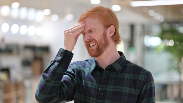 Portrait of Young Redhead Man having Headache  - Valokuva, kuva