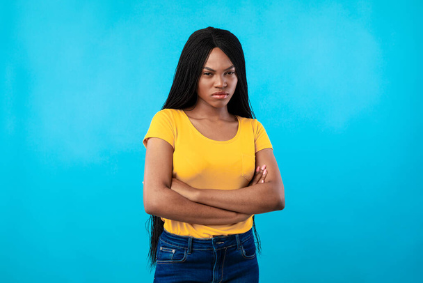 Discontented African American Woman Posing Crossing Hands On Blue Background - Photo, Image