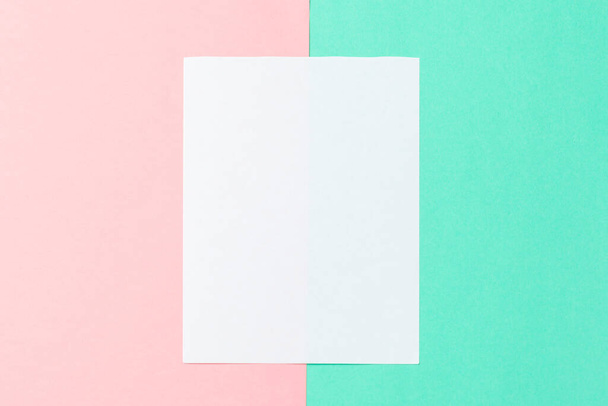 White paper and space for text on pastel color background - Photo, image