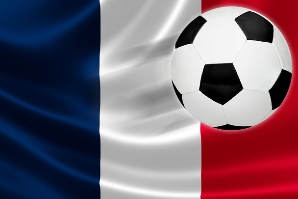 Le ballon de football sort du drapeau français
 - Photo, image