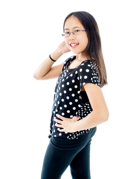 Itsevarma aasialainen teini tyttö poseeraa
 - Valokuva, kuva