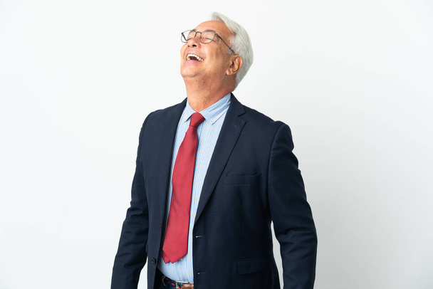 Middle age Brazilian business man isolated on white background laughing - Foto, Imagen