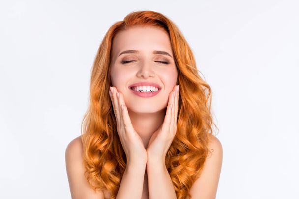 Photo portrait of young model with curly red hair smiling touching moisturized silky skin isolated on white color background - Φωτογραφία, εικόνα