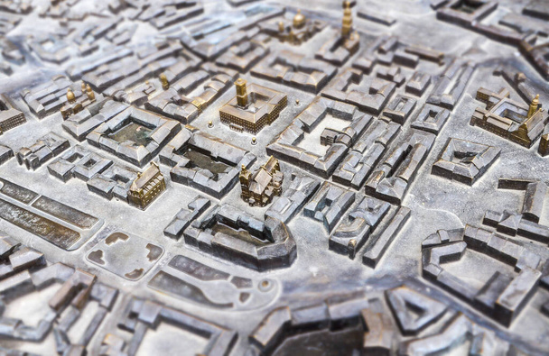 LVIV UKRAINE - 14 DECEMBER 2019 Miniature model of old town district of Lviv made of metal and installed in the Market Square. Selective focus - Photo, Image