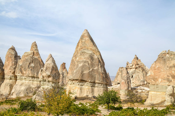 Beautiful landscape of ancient geological formation called fairy chimneys in Cappadocia valley, Turkey - Photo, image