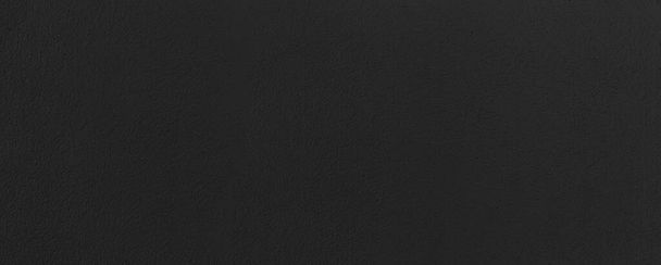 Panorama van lederen textuur zwart grijze achtergrond. textuur van echt leer. Achtergrond textuur effect voor design. Kunstmatig eco leer close-up - Foto, afbeelding