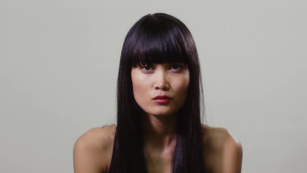 szomorú ázsiai lány - Felvétel, videó