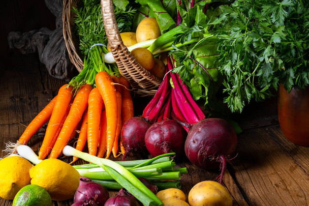 Basket with different vegetables: beetroot and carrot - Photo, Image
