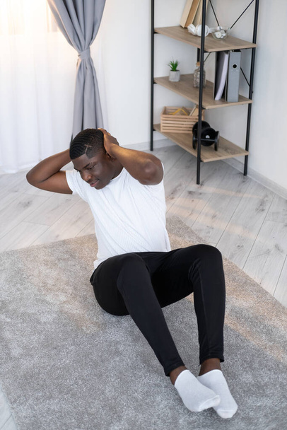 sportive black man home fitness strong body shape - Foto, Imagem