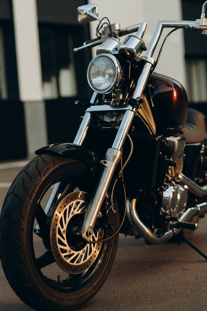 Freedom.Motorcycle parking, front view. Stylish custom chopper motobike with chrome details. Soft selective focus. - Zdjęcie, obraz