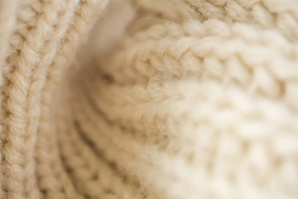 closeup beige knitted woolen fabric background - Photo, Image