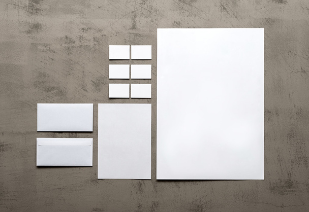 set of corporate identity templates on a gray wall - Photo, Image
