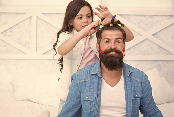 Adorable small daughter child style bearded man fathers hair, haircare - Foto, afbeelding