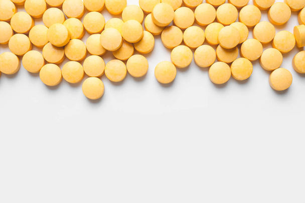 Vitamin K pills on light background - Foto, afbeelding