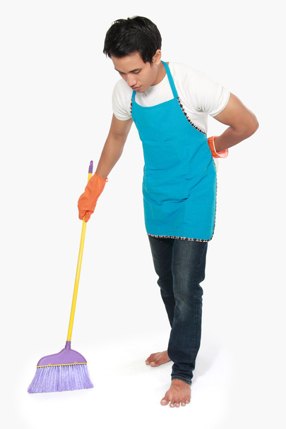 man cleaning floor - 写真・画像