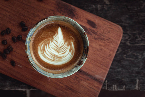 Selective focus cup of hot latte art coffee,focus at white foam - Foto, Imagem