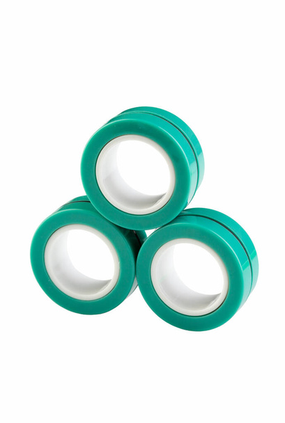 antistress, magnetic rings, green, children's toy 8 + - Фото, изображение
