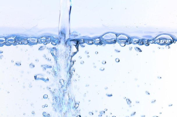 Water bubbles blose up on white background - Valokuva, kuva