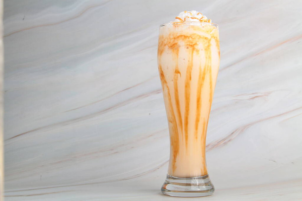 Photo of freshly made iced flavored coffee drink. - Photo, Image