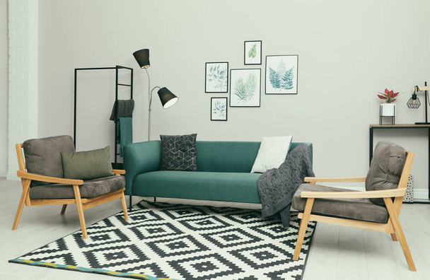 Modern living room interior with stylish comfortable sofa - Valokuva, kuva