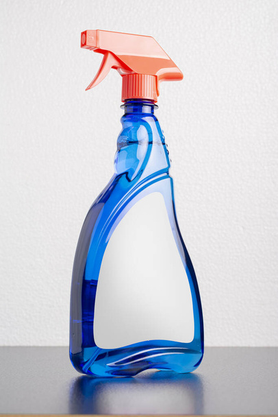 A cleaning liquid bottle on a gray background, editable mock-up series template ready for your design - Φωτογραφία, εικόνα