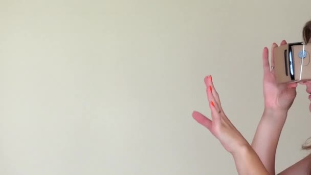 woman touch something use modern 3D vr glasses indoors. modern technology. 4K - Felvétel, videó