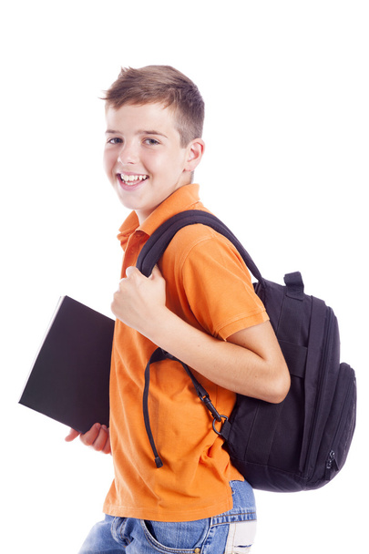Portrait of a school boy with backpack holding a notebook, isola - Fotoğraf, Görsel