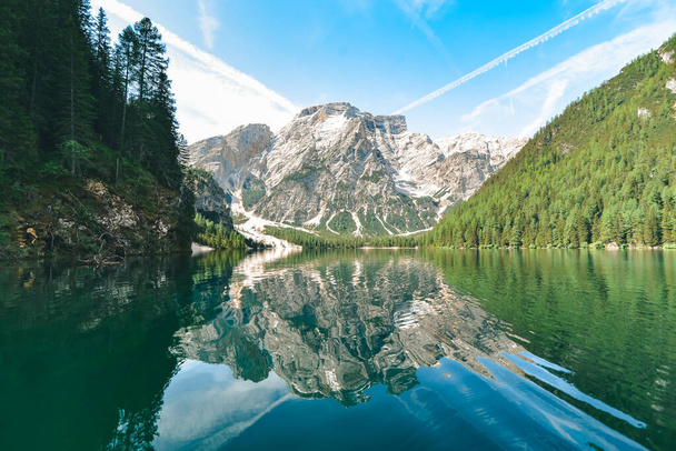 landscape view of alpine lake summer time. reflection in water surface - Photo, Image
