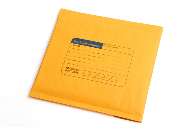 Yellow letter envelope isolated with clipping path. - Photo, Image