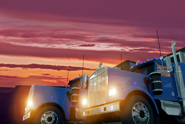 Samochody ciężarowe w zachód słońca - Zdjęcie, obraz