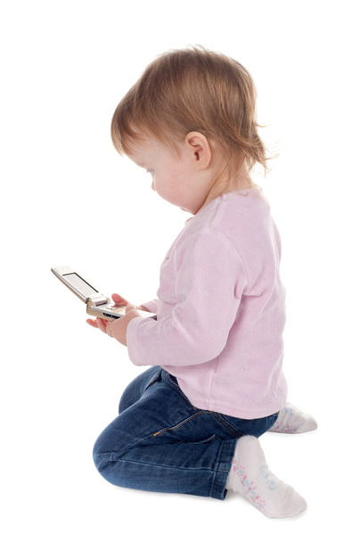 Girl plays with mobile phone - Photo, Image
