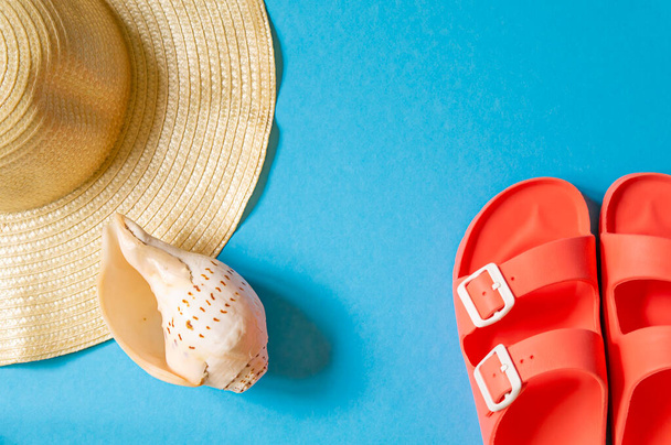 Beach accessories on blue background, copy space.  - Photo, Image