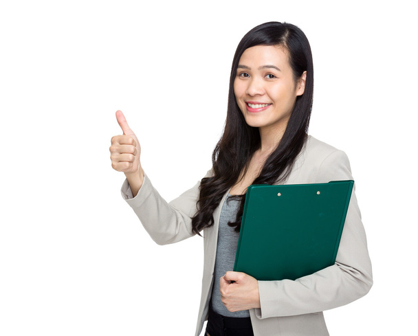 Business woman with clipboard and thumb up - Photo, Image