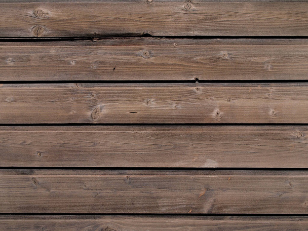 A closeup shot of patterned wooden wall - perfect for mobile - Foto, imagen